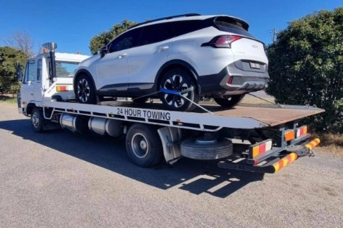 Tow Truck with  13 TILT plates.